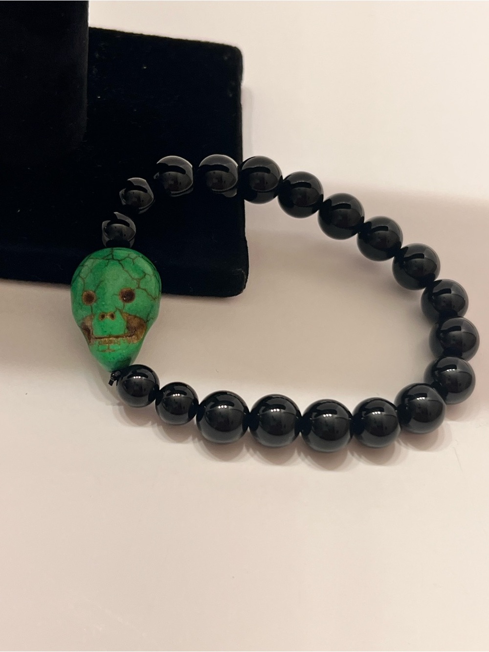 Black Bead Bracelet with Green Turquoise Skull Accent Unisex